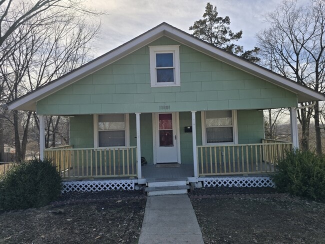 property at 11401 E 9th St S