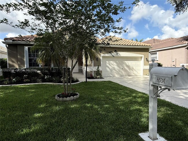 property at 6534 NW 80th Dr