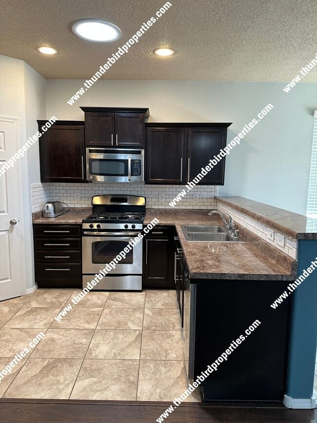 11624 Thistledown Rd SE in Albuquerque, NM - Building Photo - Building Photo