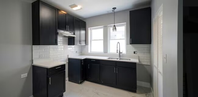 property at 7305 S Yates Blvd