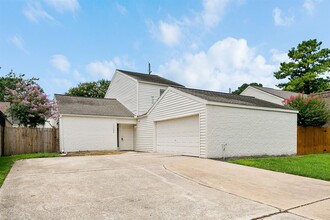 12009 Champion Forest Dr in Houston, TX - Building Photo - Building Photo