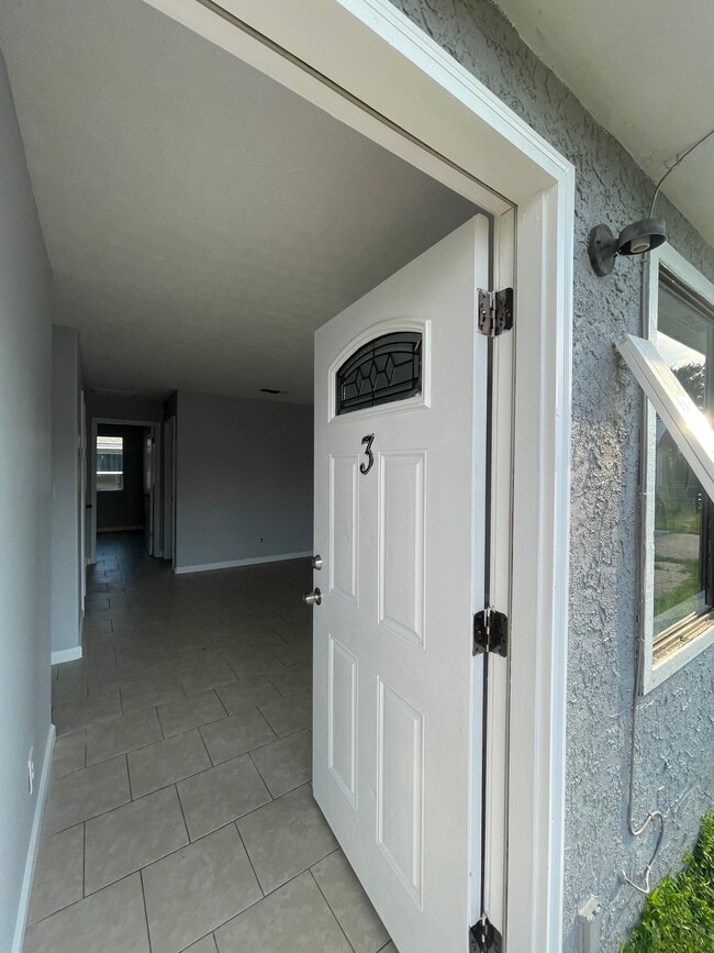 property at 715 W 13th St