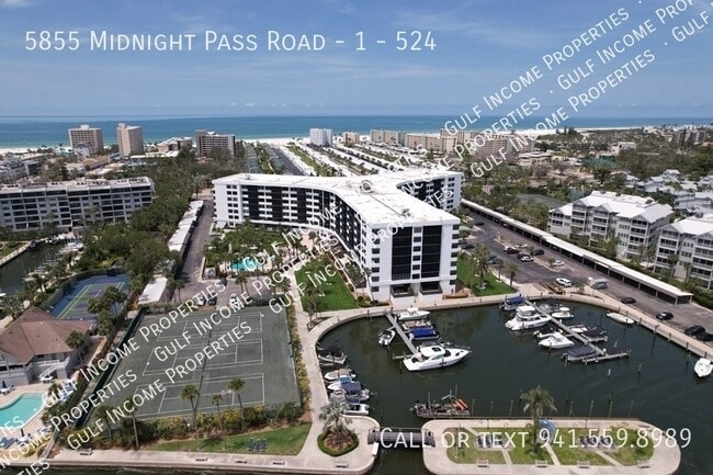 property at 5855 Midnight Pass Rd