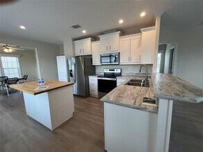 12116 County Rd 769 in Lake Suzy, FL - Building Photo - Building Photo