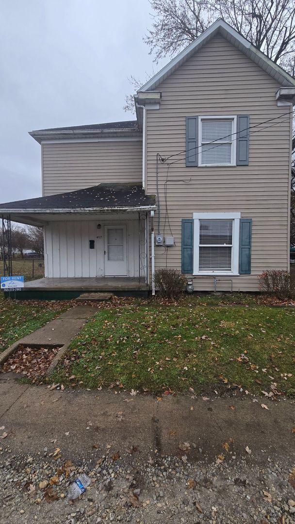 property at 407 W 8th St