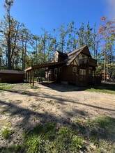 6848 Whispering Pines Dr in Gaylord, MI - Building Photo - Building Photo
