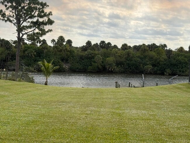 property at 11816 SW Grapefruit Ct