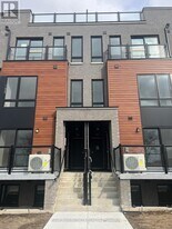 165 Tapscott Rd in Toronto, ON - Building Photo