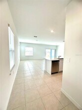 8795 Coqui Song Ln in Land O Lakes, FL - Foto de edificio - Building Photo