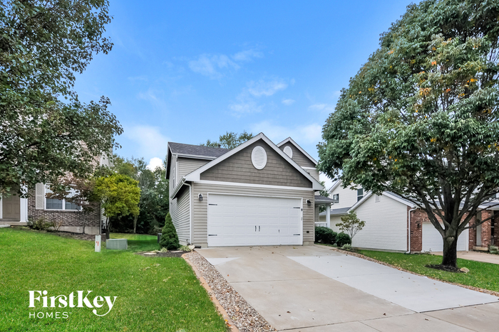 1311 Flintshire Ln in Lake St. Louis, MO - Building Photo