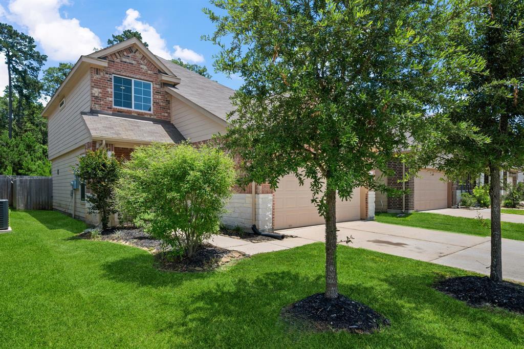 4266 McGregor Blf Ln in Conroe, TX - Building Photo