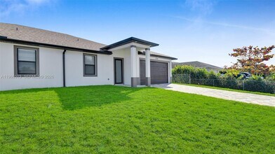 1123 Hightower Ave S in Lehigh Acres, FL - Building Photo - Building Photo