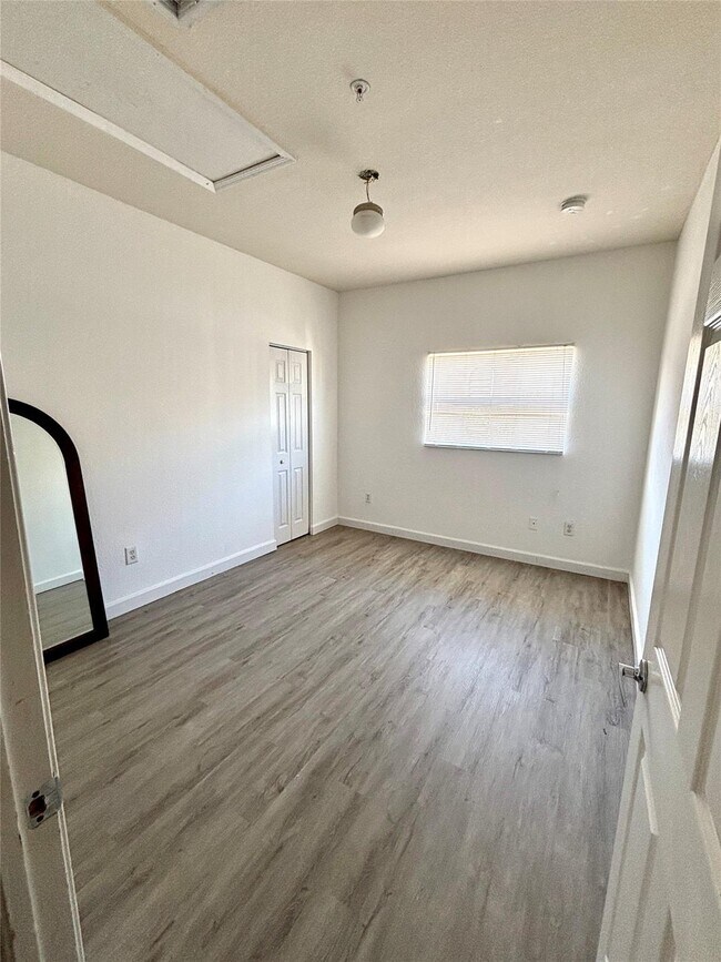 property at 451 NE 1st St