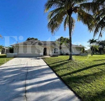 2225 Tropicana Parkway W in Cape Coral, FL - Building Photo