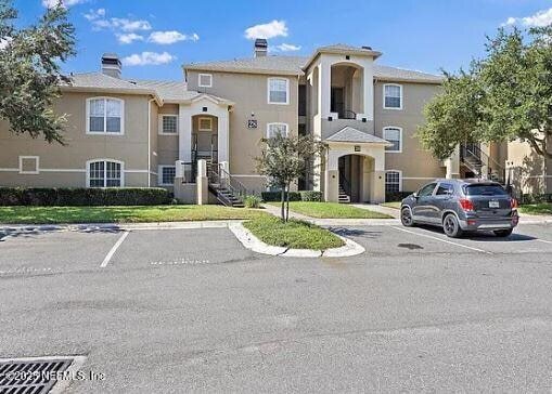 1655 The Greens Way, Unit 2225 in Jacksonville Beach, FL - Building Photo - Building Photo