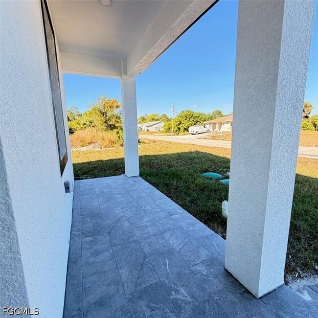 209-211 W 12th St in Lehigh Acres, FL - Building Photo - Building Photo