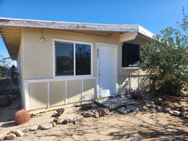 property at 6537-6539 Persia Ave