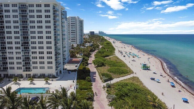 property at 6917 Collins Ave