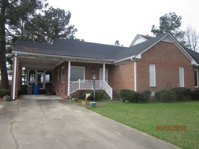 property at 4801 Olympic Ln N