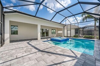 8786 St Lucia Dr, Unit 2nd Fl in Naples, FL - Building Photo - Building Photo