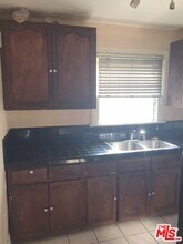 4615 S Gramercy Pl in Los Angeles, CA - Building Photo - Building Photo