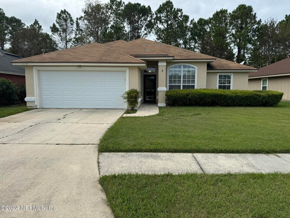 31175 Grassy Parke Dr in Fernandina Beach, FL - Building Photo