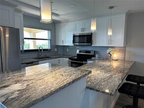 12500 Capri Cir N in Treasure Island, FL - Building Photo - Building Photo