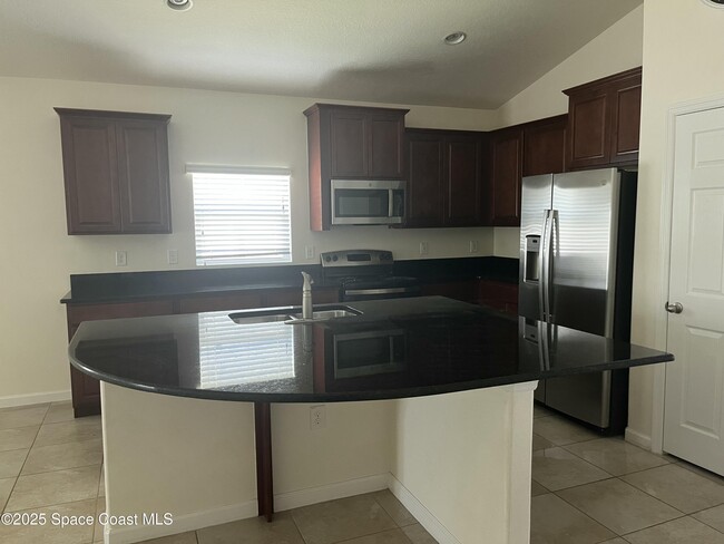 1343 Musgrass Cir in West Melbourne, FL - Building Photo - Building Photo