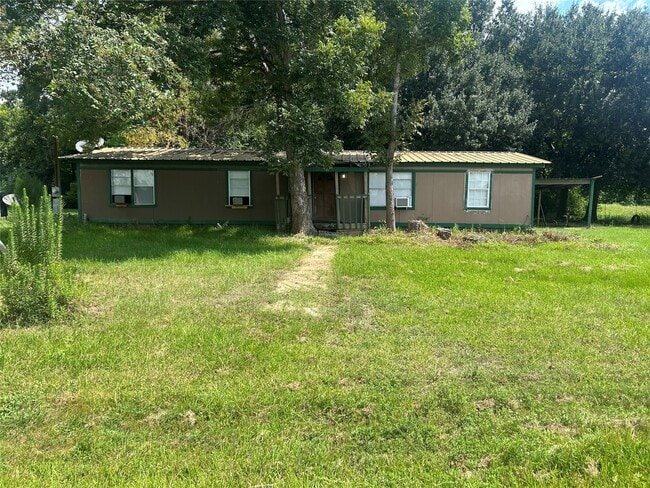 210 Melton St in Magnolia, TX - Building Photo - Building Photo