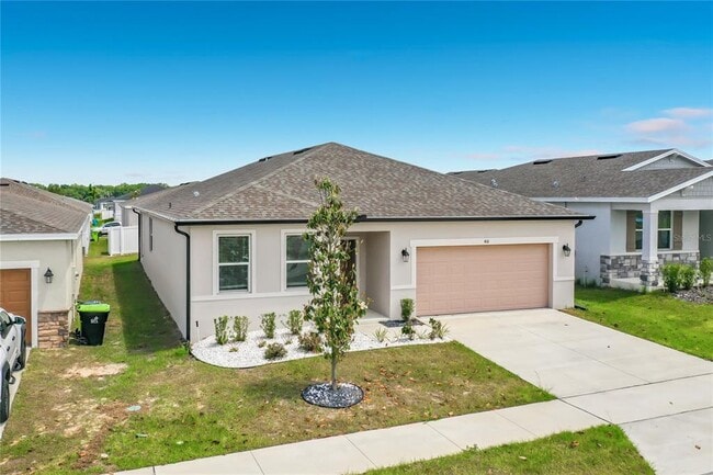 418 Quayside Ave in Mascotte, FL - Building Photo - Building Photo