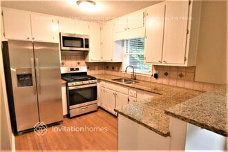 1110 Wood Valley Rd in Cumming, GA - Foto de edificio - Building Photo