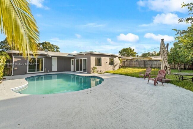 property at 4777 NW 5th St