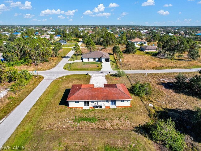 4461 26th St SW in Lehigh Acres, FL - Foto de edificio - Building Photo