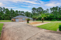 7152 Snug Waters Rd in Navarre, FL - Foto de edificio - Building Photo