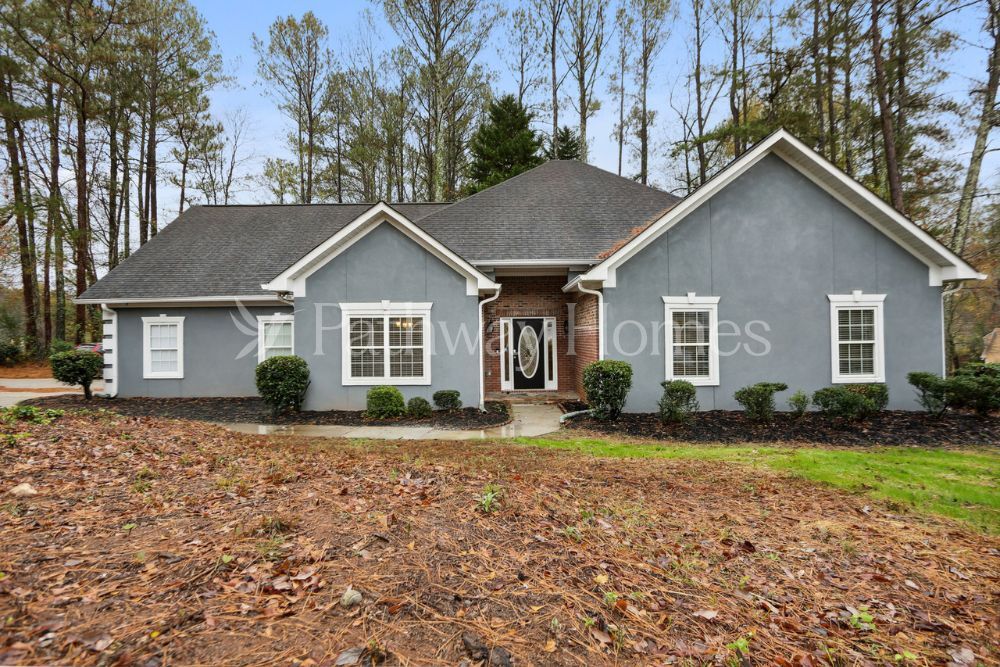 7407 Woodruff Way in Stone Mountain, GA - Building Photo