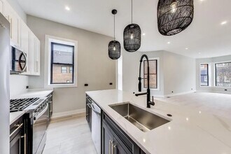 1311 N Rockwell St, Unit Unit 1 in Chicago, IL - Foto de edificio - Building Photo