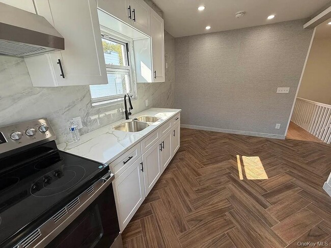 property at 60-50 59th Dr