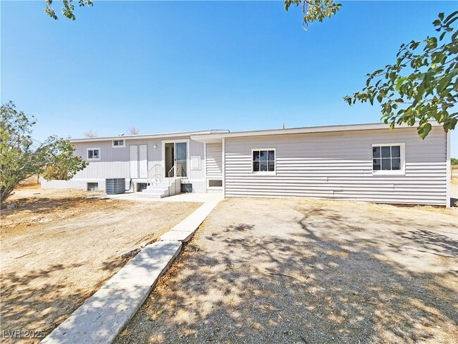 7701 S Arabian Way in Pahrump, NV - Building Photo - Building Photo
