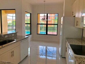 13711 Callisto Ave in Naples, FL - Building Photo - Building Photo