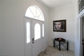 11002 Vanderbilt Dr in Naples, FL - Foto de edificio - Building Photo