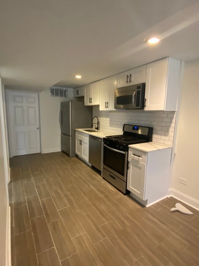 1718 N Campbell Ave, Unit G in Chicago, IL - Building Photo - Building Photo