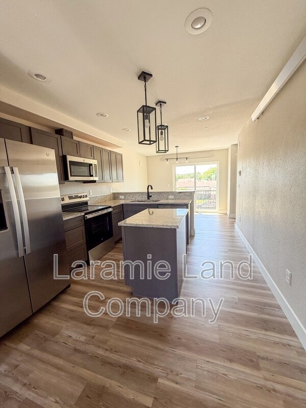 569 N 12th St in Laramie, WY - Foto de edificio - Building Photo