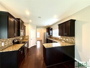 210 Willow Oak Dr in Richmond Hill, GA - Building Photo - Building Photo
