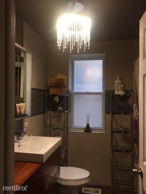 6945 S Paxton Ave-Unit -Apt 1 in Chicago, IL - Foto de edificio - Building Photo