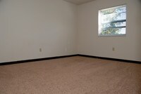 Spacious Master Bedroom - University Hilltop Apartments in Chillicothe, Ohio