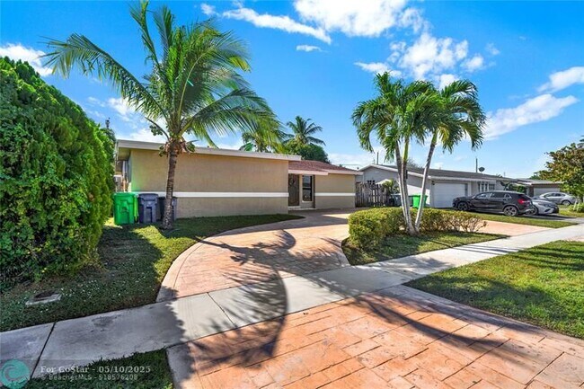 property at 9650 NW 24th St