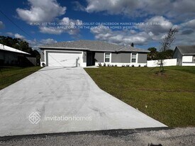 1109 SW Khan Dr in Port St. Lucie, FL - Building Photo