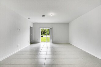 5908 NW Fairfax Ave in Port St. Lucie, FL - Building Photo - Building Photo