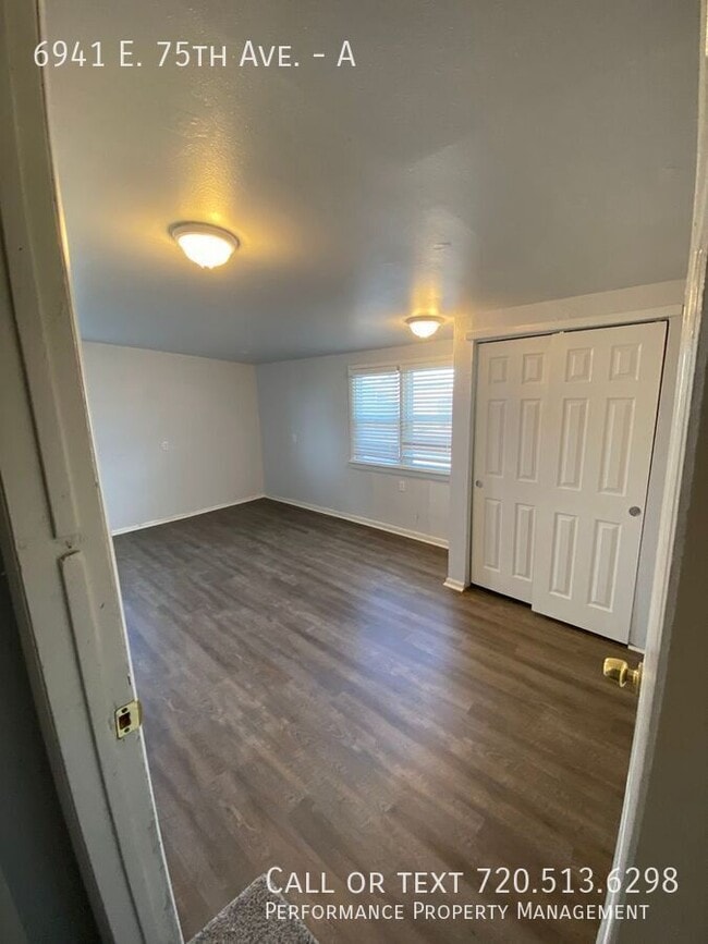 property at 6941 E 75th Ave