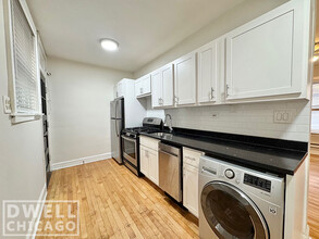 1421 W Hutchinson St, Unit 1 in Chicago, IL - Building Photo - Building Photo